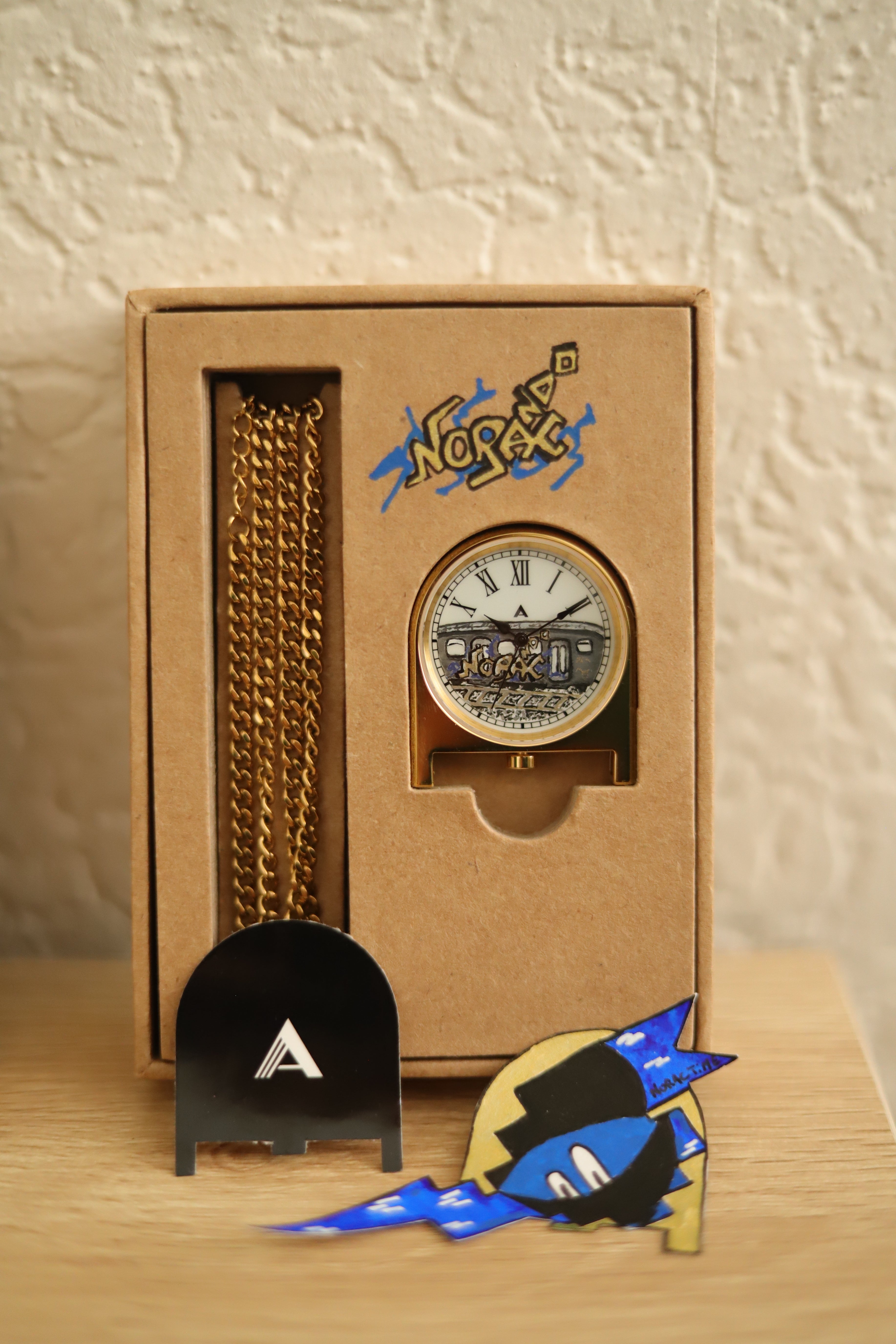 Pendant clock designed by AndoAndoAndo, hand painted by NoracTime